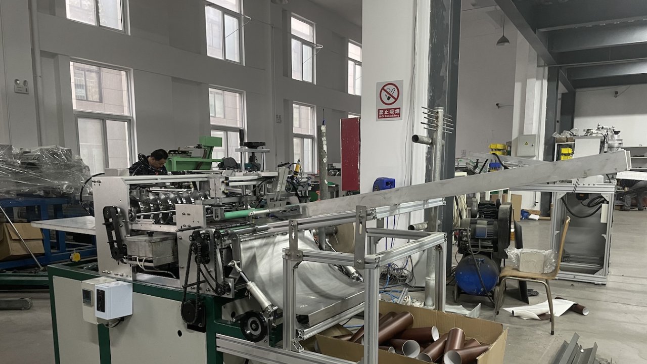 Composite paper tube labeling machine